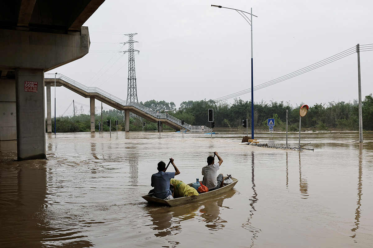 Екологічні проблеми Зіна клімату Китай Повінь Гуандун Фото